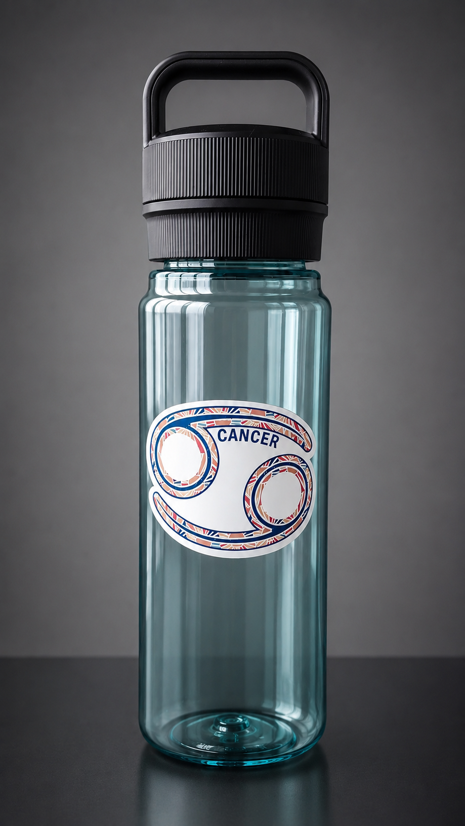 A translucent teal water bottle with a black screw-on cap and carrying loop, featuring a Cancer zodiac sign graphic on the front, set against a dark gray studio background.