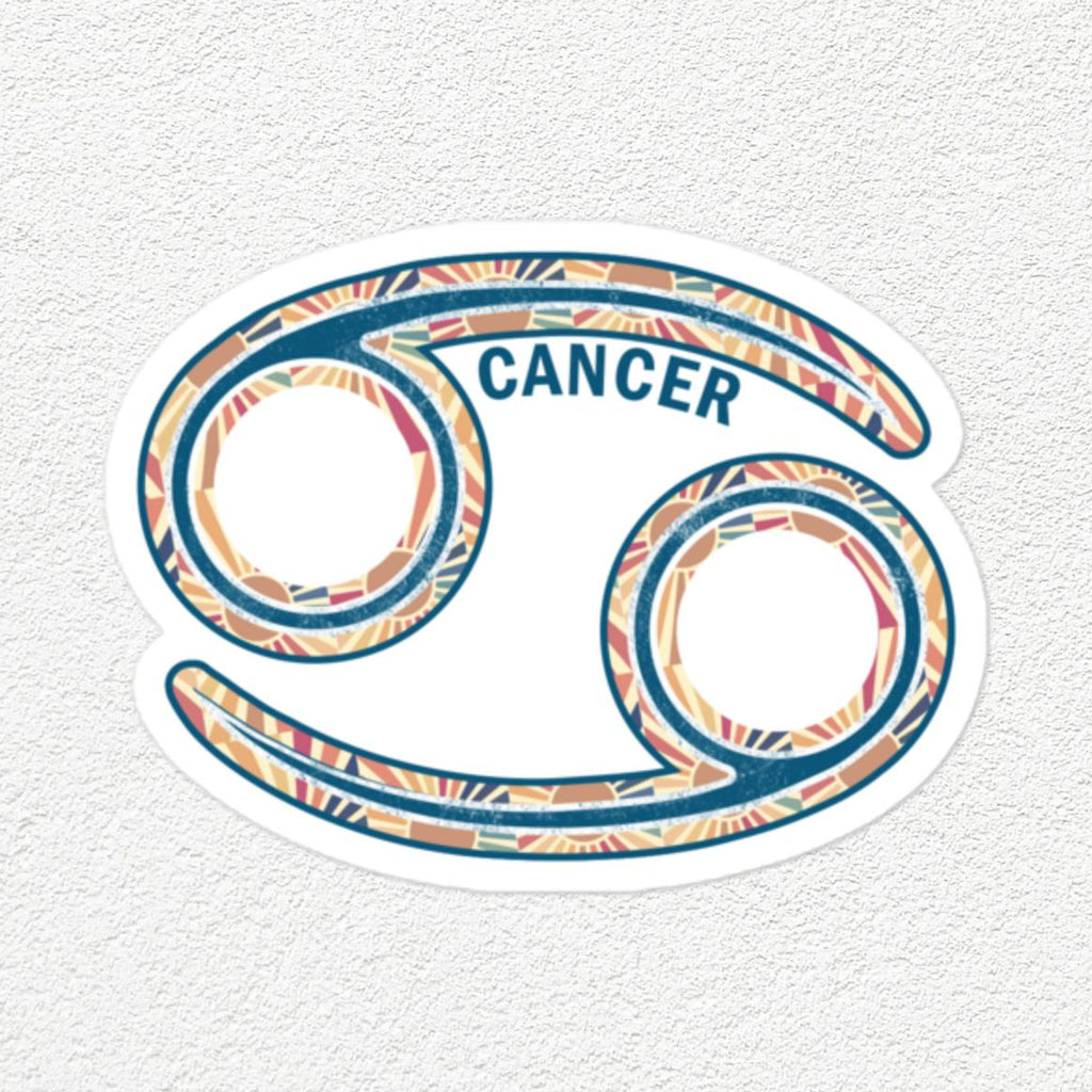 A Cancer zodiac sign sticker featuring a stylized astrological symbol with a colorful patterned border and the word 'CANCER' in blue, shown on a textured off-white background.